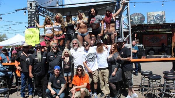 A lively outdoor gathering at The Hideaway Grill during Cave Creek Bike Week