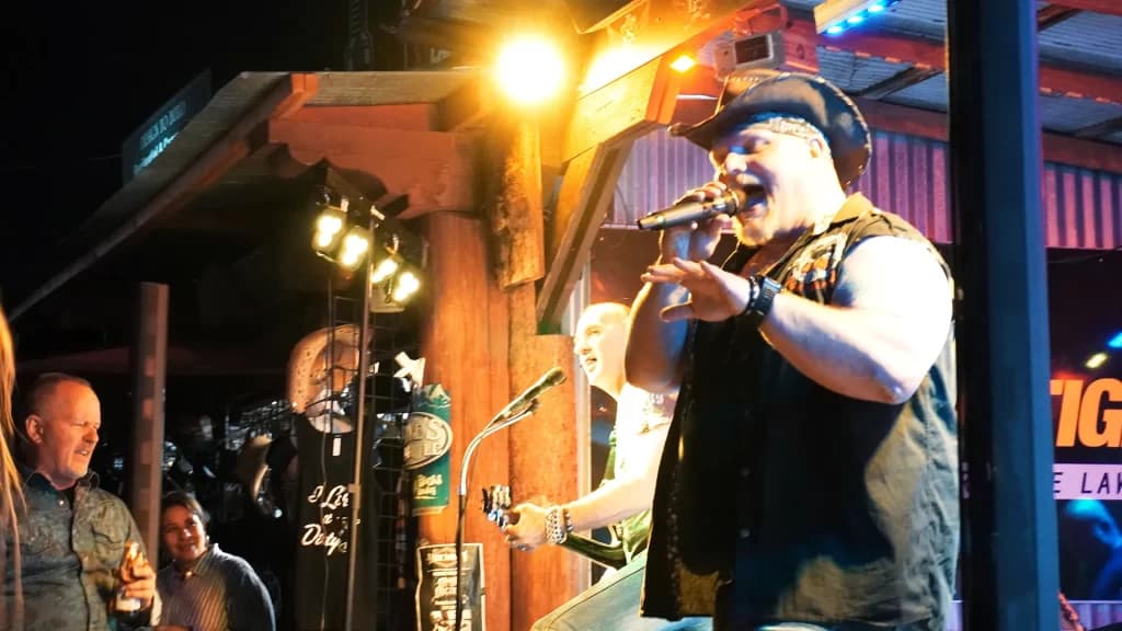 A band performing on The Hideaway Grill patio stage